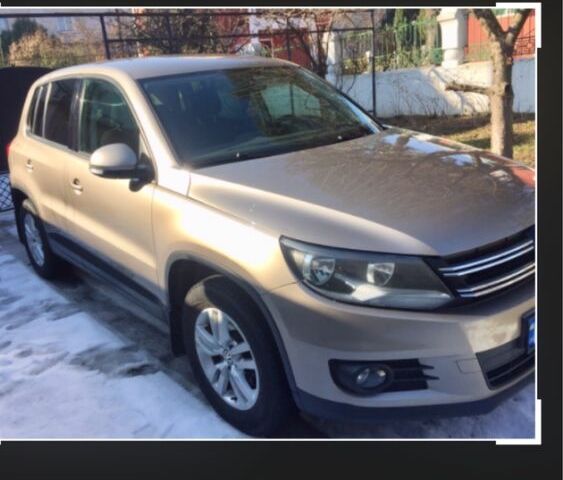 Сірий Фольксваген Тігуан, об'ємом двигуна 1.4 л та пробігом 235 тис. км за 13100 $, фото 1 на Automoto.ua