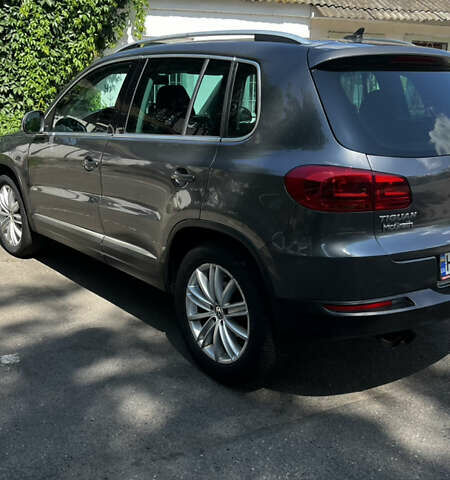 Серый Фольксваген Тигуан, объемом двигателя 1.98 л и пробегом 258 тыс. км за 10500 $, фото 3 на Automoto.ua