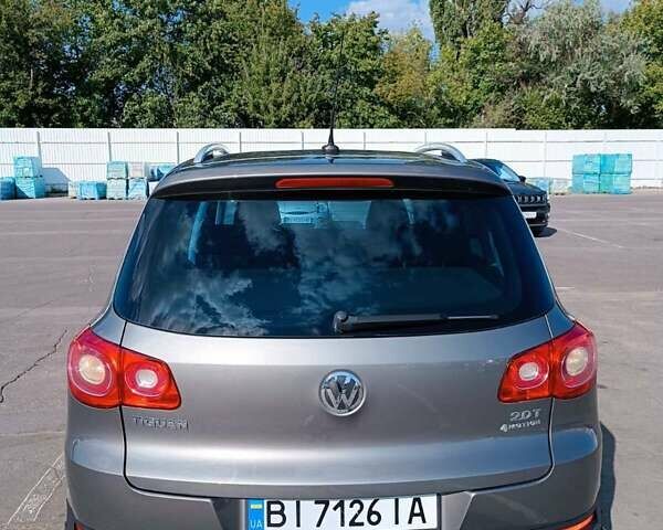 Серый Фольксваген Тигуан, объемом двигателя 1.98 л и пробегом 165 тыс. км за 11700 $, фото 6 на Automoto.ua