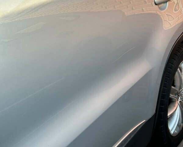 Серый Фольксваген Тигуан, объемом двигателя 1.98 л и пробегом 199 тыс. км за 9400 $, фото 7 на Automoto.ua