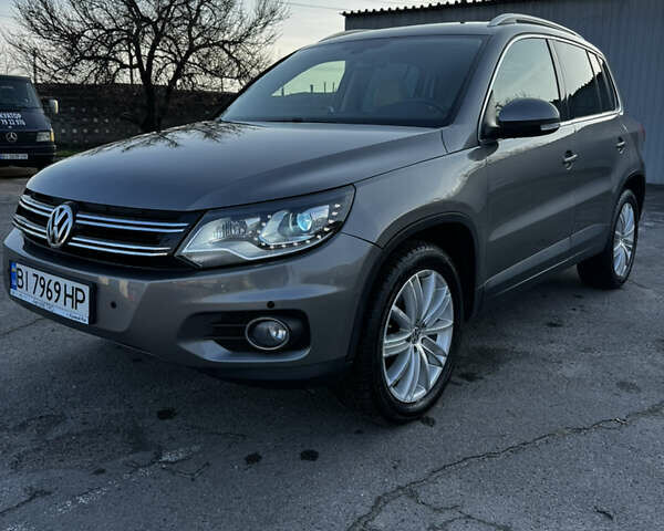 Сірий Фольксваген Тігуан, об'ємом двигуна 1.98 л та пробігом 268 тис. км за 10800 $, фото 1 на Automoto.ua