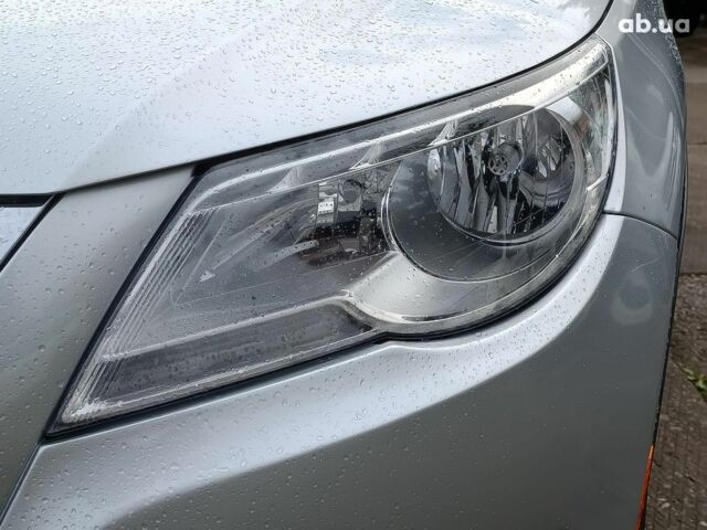 Сірий Фольксваген Тігуан, об'ємом двигуна 2 л та пробігом 189 тис. км за 10990 $, фото 2 на Automoto.ua