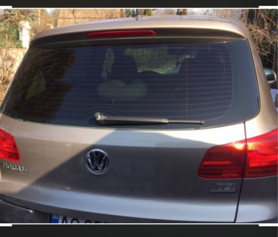 Сірий Фольксваген Тігуан, об'ємом двигуна 1.4 л та пробігом 235 тис. км за 13100 $, фото 5 на Automoto.ua