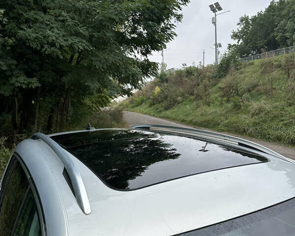 Сірий Фольксваген Тігуан, об'ємом двигуна 2 л та пробігом 272 тис. км за 9499 $, фото 5 на Automoto.ua