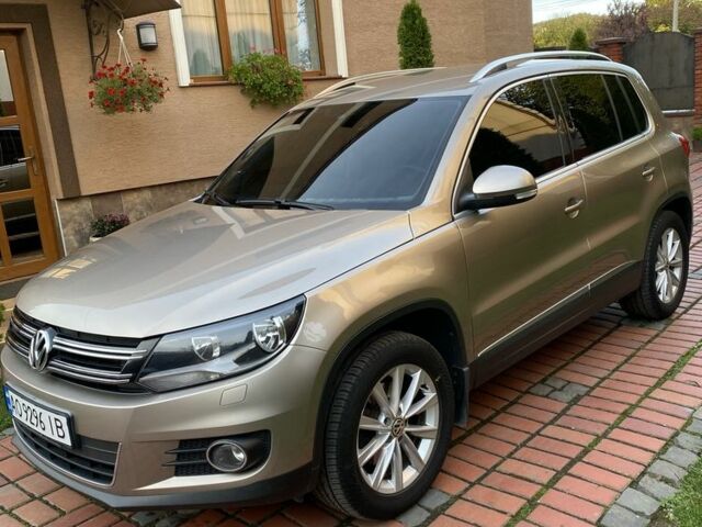 Серый Фольксваген Тигуан, объемом двигателя 1.4 л и пробегом 250 тыс. км за 10000 $, фото 1 на Automoto.ua