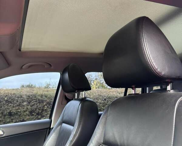 Сірий Фольксваген Тігуан, об'ємом двигуна 2 л та пробігом 117 тис. км за 11000 $, фото 8 на Automoto.ua