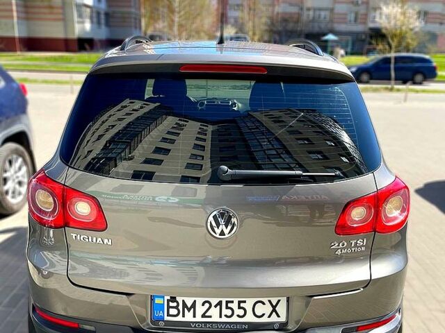 Серый Фольксваген Тигуан, объемом двигателя 2 л и пробегом 223 тыс. км за 12000 $, фото 5 на Automoto.ua