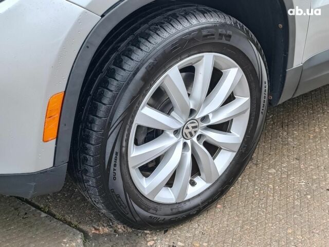 Сірий Фольксваген Тігуан, об'ємом двигуна 2 л та пробігом 189 тис. км за 10990 $, фото 4 на Automoto.ua