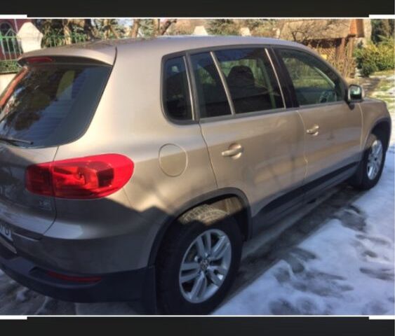 Сірий Фольксваген Тігуан, об'ємом двигуна 1.4 л та пробігом 235 тис. км за 13100 $, фото 3 на Automoto.ua