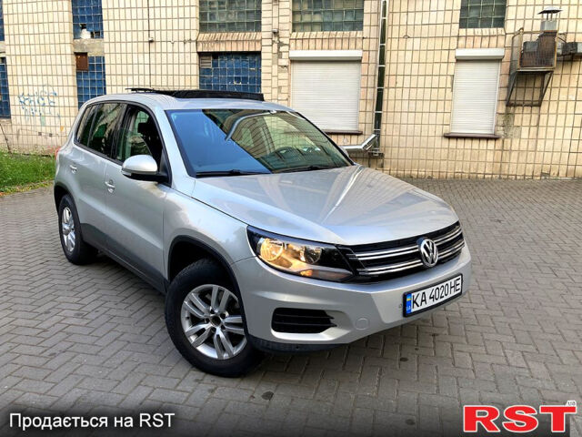 Серый Фольксваген Тигуан, объемом двигателя 2 л и пробегом 170 тыс. км за 12500 $, фото 2 на Automoto.ua