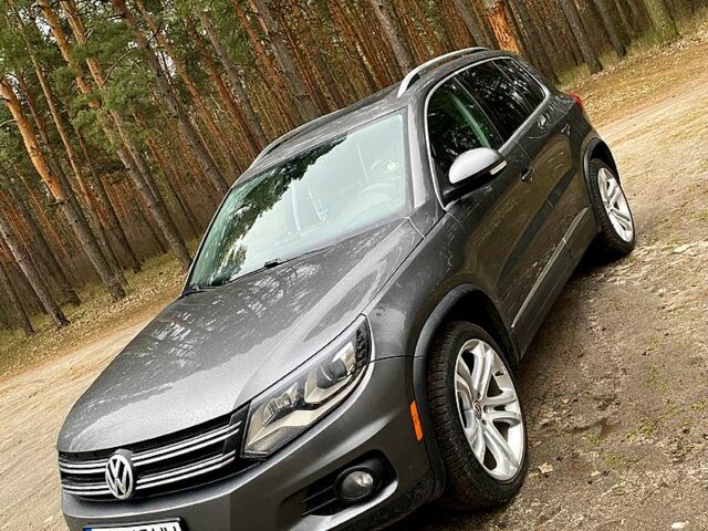 Серый Фольксваген Тигуан, объемом двигателя 2 л и пробегом 300 тыс. км за 11700 $, фото 2 на Automoto.ua