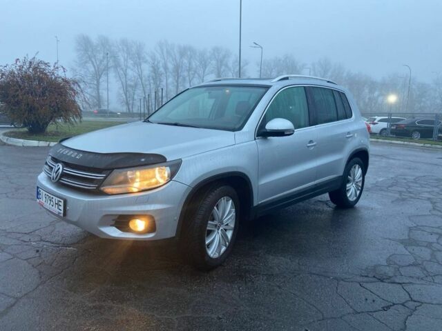Серый Фольксваген Тигуан, объемом двигателя 2 л и пробегом 176 тыс. км за 10999 $, фото 5 на Automoto.ua