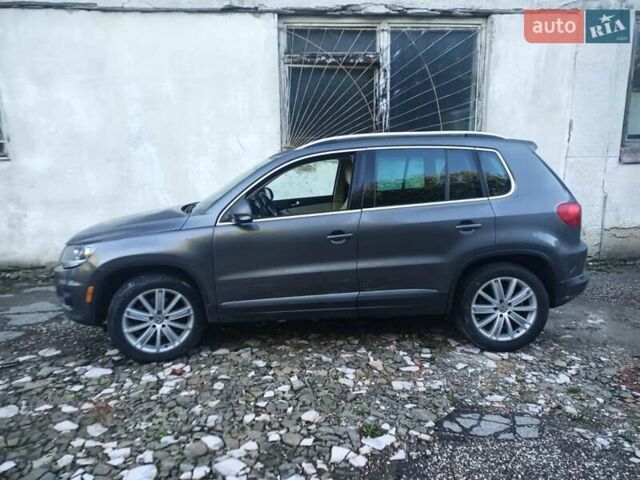Сірий Фольксваген Тігуан, об'ємом двигуна 2 л та пробігом 150 тис. км за 11000 $, фото 2 на Automoto.ua