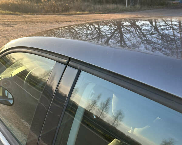 Серый Фольксваген Тигуан, объемом двигателя 1.98 л и пробегом 220 тыс. км за 11000 $, фото 12 на Automoto.ua