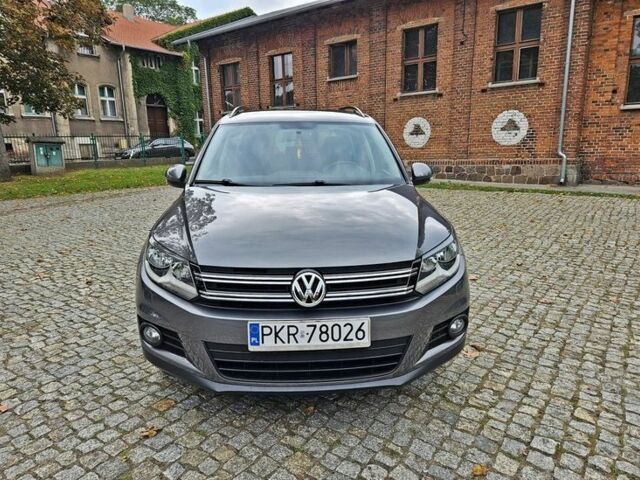 Серый Фольксваген Тигуан, объемом двигателя 1.4 л и пробегом 100 тыс. км за 8000 $, фото 2 на Automoto.ua