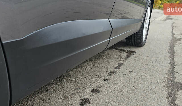 Серый Фольксваген Тигуан, объемом двигателя 2 л и пробегом 260 тыс. км за 13450 $, фото 9 на Automoto.ua