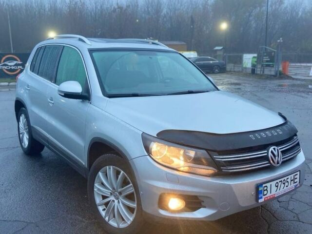 Серый Фольксваген Тигуан, объемом двигателя 2 л и пробегом 176 тыс. км за 10999 $, фото 1 на Automoto.ua