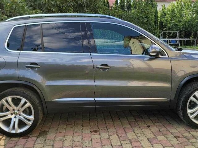 Серый Фольксваген Тигуан, объемом двигателя 2 л и пробегом 170 тыс. км за 12500 $, фото 2 на Automoto.ua