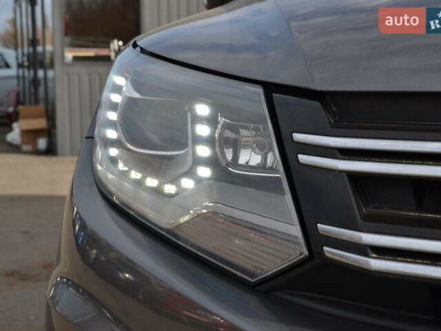 Сірий Фольксваген Тігуан, об'ємом двигуна 1.98 л та пробігом 310 тис. км за 10999 $, фото 32 на Automoto.ua