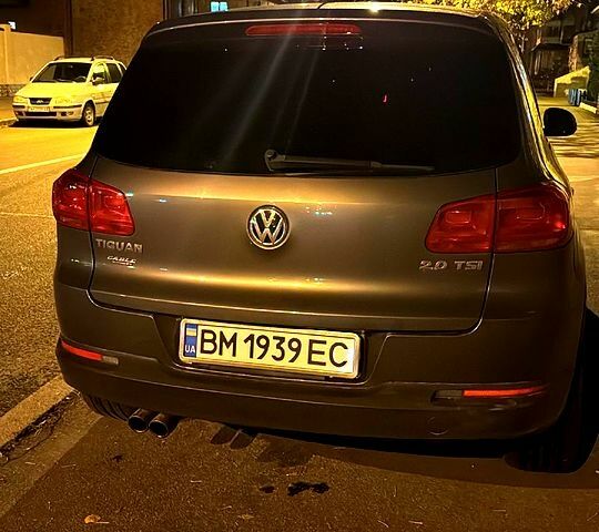 Сірий Фольксваген Тігуан, об'ємом двигуна 2 л та пробігом 196 тис. км за 12000 $, фото 1 на Automoto.ua