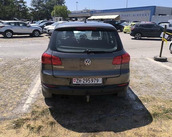 Серый Фольксваген Тигуан, объемом двигателя 1.4 л и пробегом 195 тыс. км за 8311 $, фото 6 на Automoto.ua