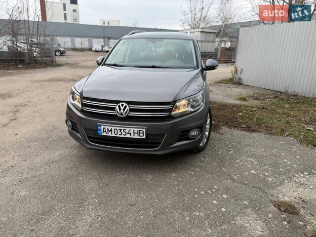 Серый Фольксваген Тигуан, объемом двигателя 1.97 л и пробегом 247 тыс. км за 14500 $, фото 1 на Automoto.ua