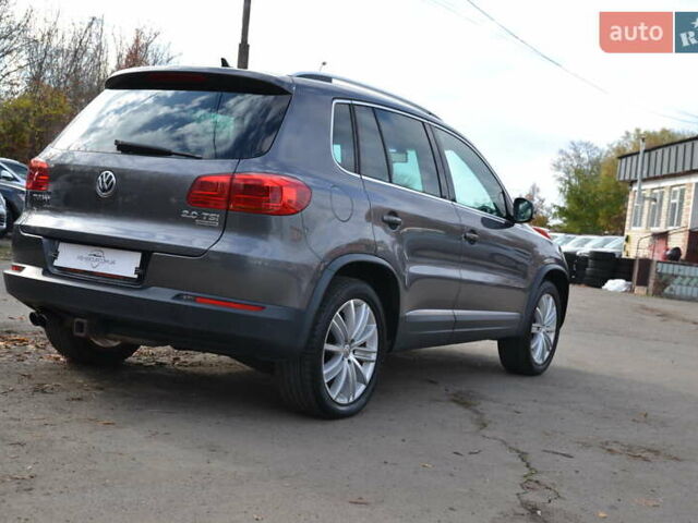 Сірий Фольксваген Тігуан, об'ємом двигуна 1.98 л та пробігом 310 тис. км за 10999 $, фото 7 на Automoto.ua