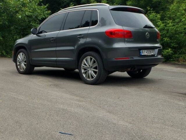 Сірий Фольксваген Тігуан, об'ємом двигуна 2 л та пробігом 205 тис. км за 12200 $, фото 4 на Automoto.ua