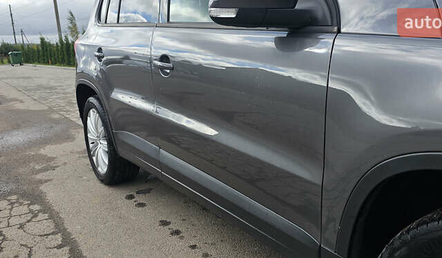 Серый Фольксваген Тигуан, объемом двигателя 2 л и пробегом 260 тыс. км за 13450 $, фото 2 на Automoto.ua