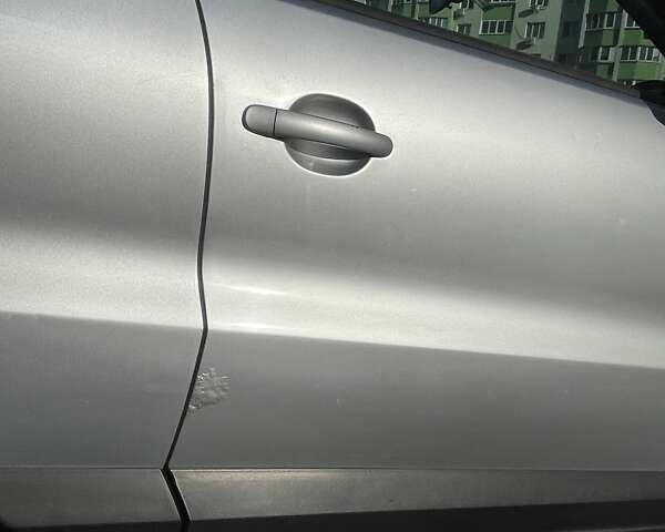 Серый Фольксваген Тигуан, объемом двигателя 1.98 л и пробегом 250 тыс. км за 13200 $, фото 15 на Automoto.ua