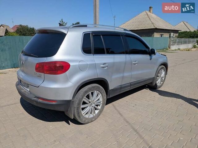 Серый Фольксваген Тигуан, объемом двигателя 1.98 л и пробегом 156 тыс. км за 12200 $, фото 2 на Automoto.ua