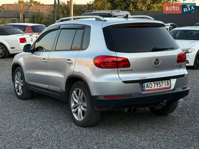 Серый Фольксваген Тигуан, объемом двигателя 1.97 л и пробегом 370 тыс. км за 11400 $, фото 5 на Automoto.ua