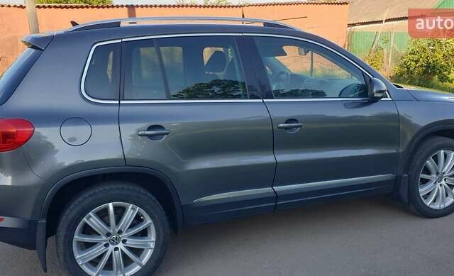 Сірий Фольксваген Тігуан, об'ємом двигуна 1.98 л та пробігом 227 тис. км за 11500 $, фото 4 на Automoto.ua