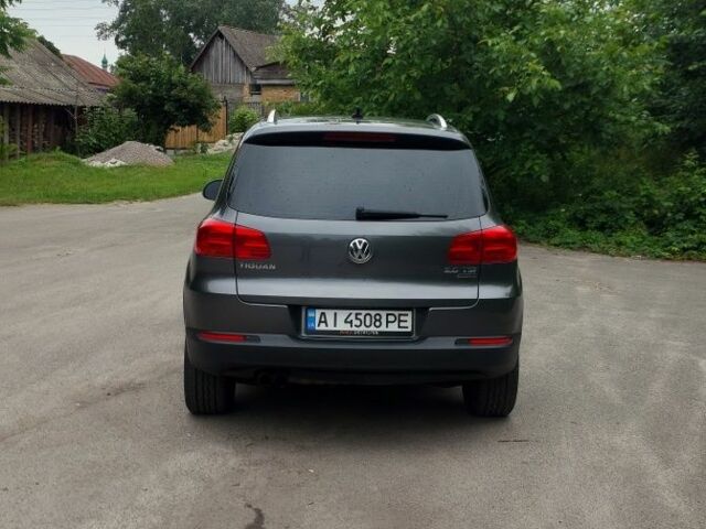 Сірий Фольксваген Тігуан, об'ємом двигуна 2 л та пробігом 205 тис. км за 12200 $, фото 5 на Automoto.ua