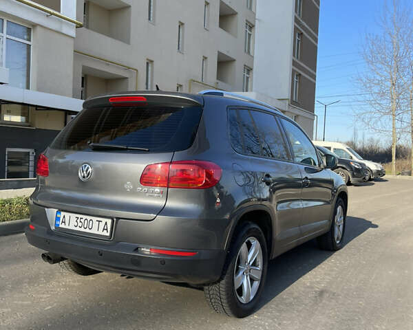 Серый Фольксваген Тигуан, объемом двигателя 1.97 л и пробегом 240 тыс. км за 15600 $, фото 3 на Automoto.ua