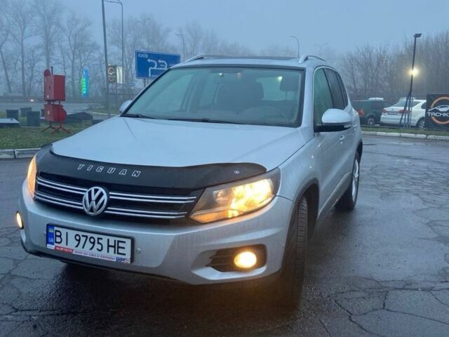 Серый Фольксваген Тигуан, объемом двигателя 2 л и пробегом 176 тыс. км за 10999 $, фото 4 на Automoto.ua
