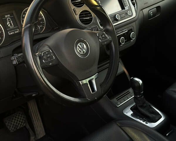 Сірий Фольксваген Тігуан, об'ємом двигуна 1.98 л та пробігом 167 тис. км за 13700 $, фото 11 на Automoto.ua