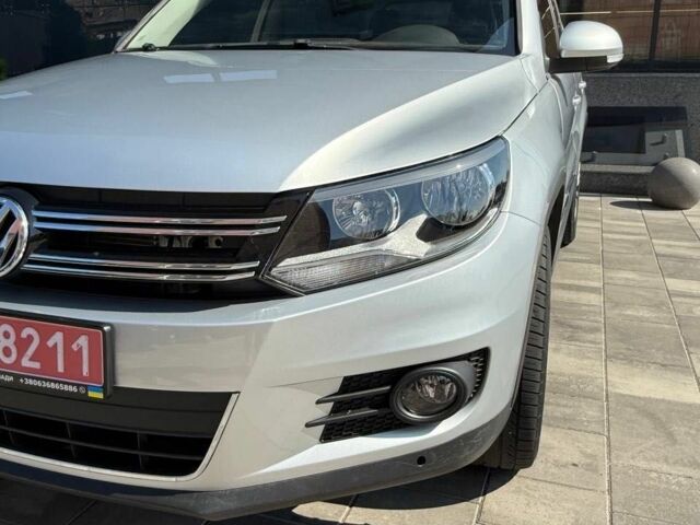 Серый Фольксваген Тигуан, объемом двигателя 2 л и пробегом 215 тыс. км за 9700 $, фото 2 на Automoto.ua