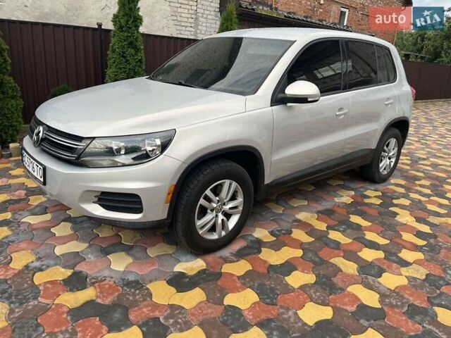 Сірий Фольксваген Тігуан, об'ємом двигуна 2 л та пробігом 255 тис. км за 9600 $, фото 1 на Automoto.ua
