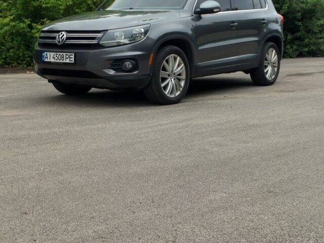 Сірий Фольксваген Тігуан, об'ємом двигуна 2 л та пробігом 205 тис. км за 12200 $, фото 2 на Automoto.ua