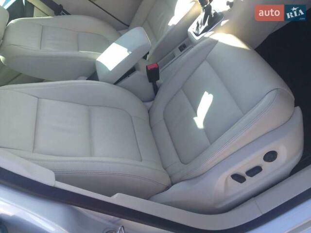 Сірий Фольксваген Тігуан, об'ємом двигуна 2 л та пробігом 165 тис. км за 12200 $, фото 1 на Automoto.ua