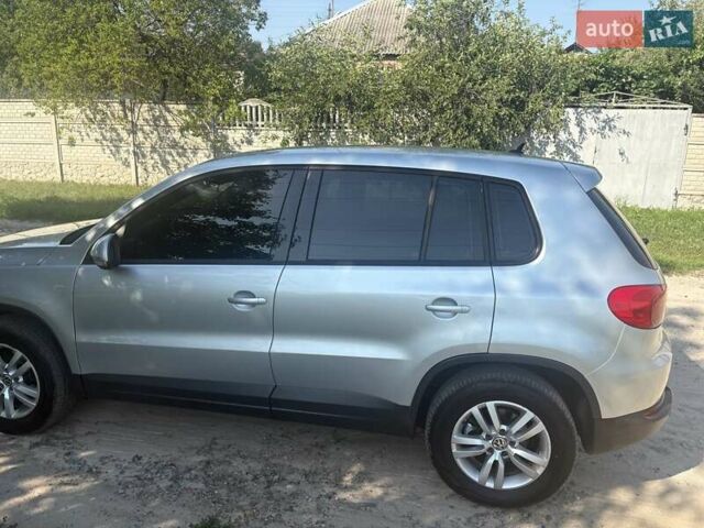 Серый Фольксваген Тигуан, объемом двигателя 1.98 л и пробегом 200 тыс. км за 14000 $, фото 2 на Automoto.ua