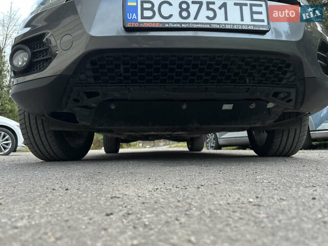 Сірий Фольксваген Тігуан, об'ємом двигуна 1.98 л та пробігом 184 тис. км за 14000 $, фото 4 на Automoto.ua