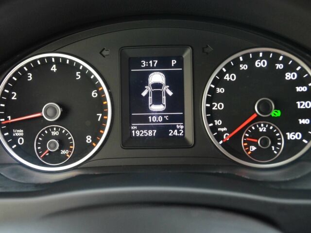 Серый Фольксваген Тигуан, объемом двигателя 2 л и пробегом 308 тыс. км за 10800 $, фото 8 на Automoto.ua