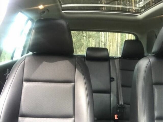 Серый Фольксваген Тигуан, объемом двигателя 2 л и пробегом 209 тыс. км за 12000 $, фото 4 на Automoto.ua