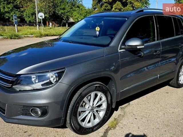 Серый Фольксваген Тигуан, объемом двигателя 1.98 л и пробегом 130 тыс. км за 14400 $, фото 1 на Automoto.ua