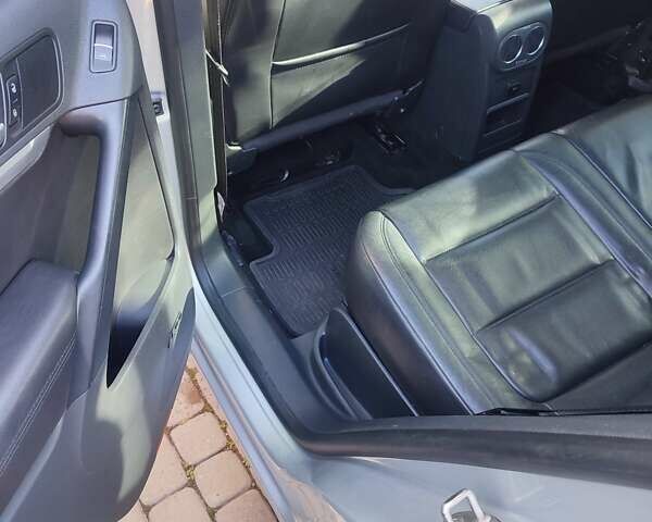 Серый Фольксваген Тигуан, объемом двигателя 1.98 л и пробегом 224 тыс. км за 11400 $, фото 13 на Automoto.ua