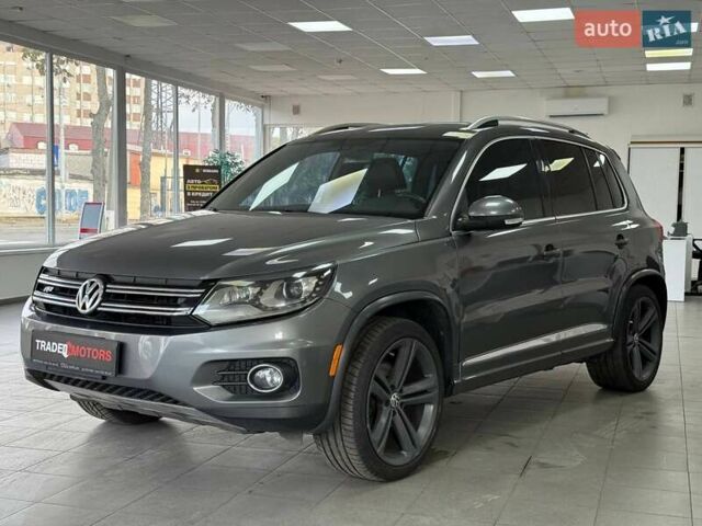 Серый Фольксваген Тигуан, объемом двигателя 2 л и пробегом 156 тыс. км за 12790 $, фото 1 на Automoto.ua