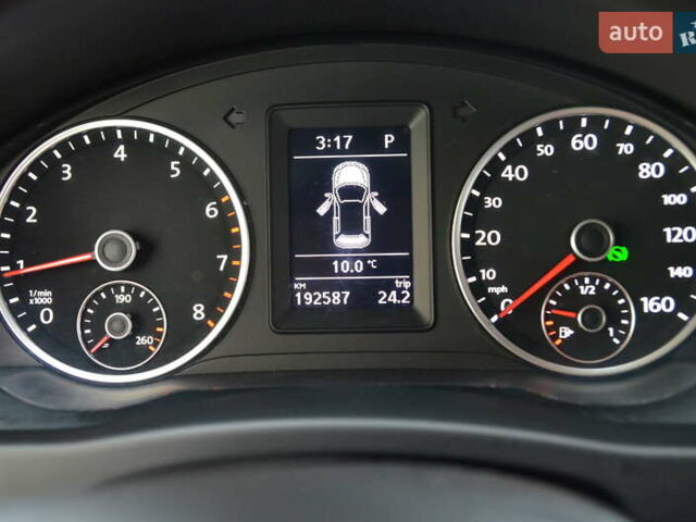 Серый Фольксваген Тигуан, объемом двигателя 1.98 л и пробегом 308 тыс. км за 10800 $, фото 7 на Automoto.ua