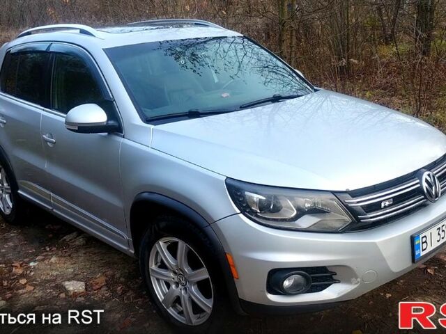 Серый Фольксваген Тигуан, объемом двигателя 2 л и пробегом 218 тыс. км за 10600 $, фото 3 на Automoto.ua